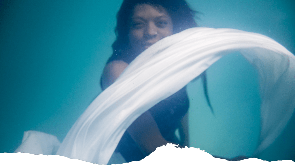 a woman with a ribbon demonstrates how SEO-friendly pillar pages work